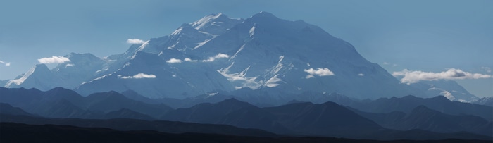 4K Denali mountain range with clouds