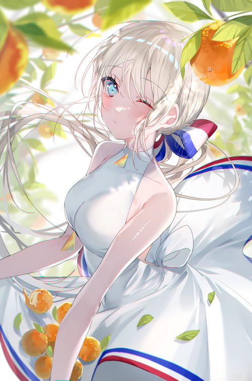 Girl in white dress with oranges and leaves