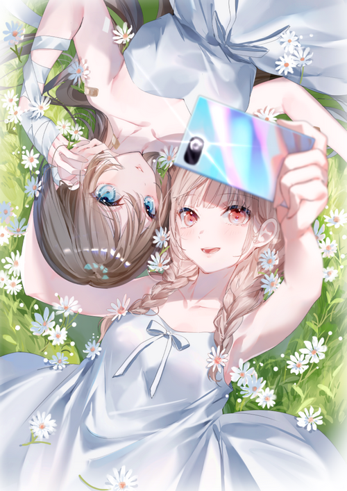 Two girls taking a selfie with a phone in a field of flowers