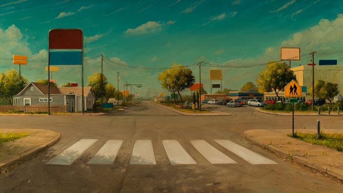 Road intersection with crosswalk and buildings