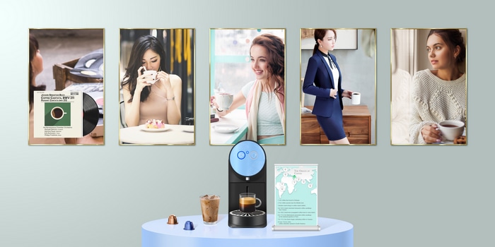 Coffee machine with framed pictures of women drinking coffee
