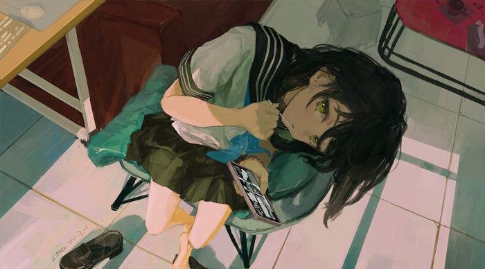Schoolgirl with green eyes holding a phone