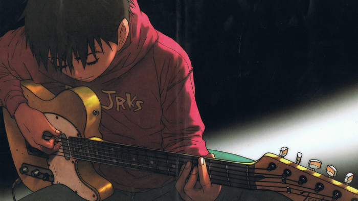 Beck playing a guitar