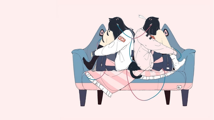 Two figures with cat ears on a couch