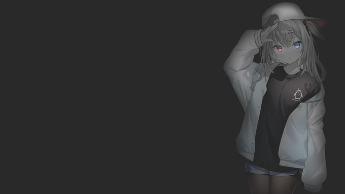Girl in jacket and hat with heterochromia