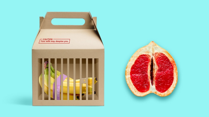 Bananas in a cage and a grapefruit