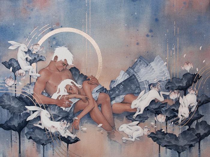 Couple resting among lotus flowers with rabbits