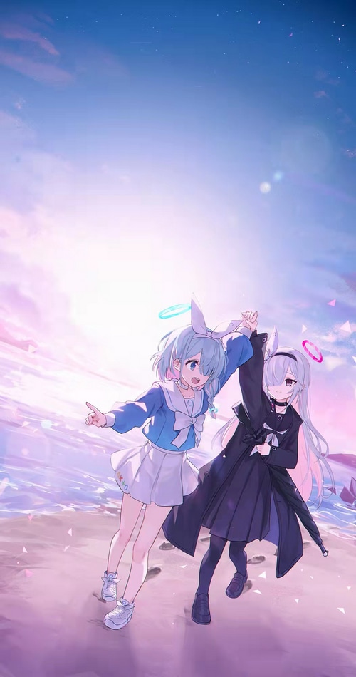 Arona and friend on a beach at sunset