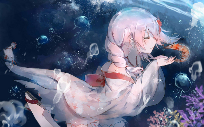 Girl in kimono holding a shrimp underwater with jellyfish