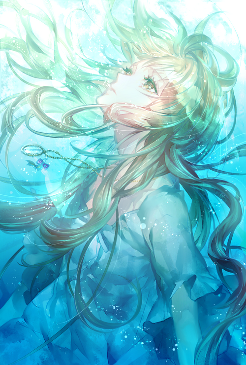 Girl underwater with flowing hair and necklace