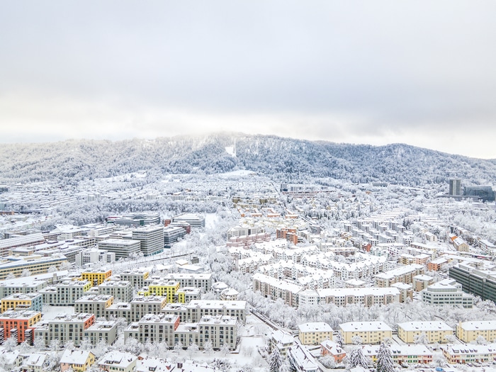 Aerial view of Zurich cityscape covered in snow