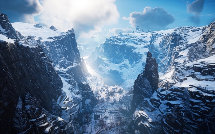 Assassin's Creed Valhalla snowy mountain valley with settlement