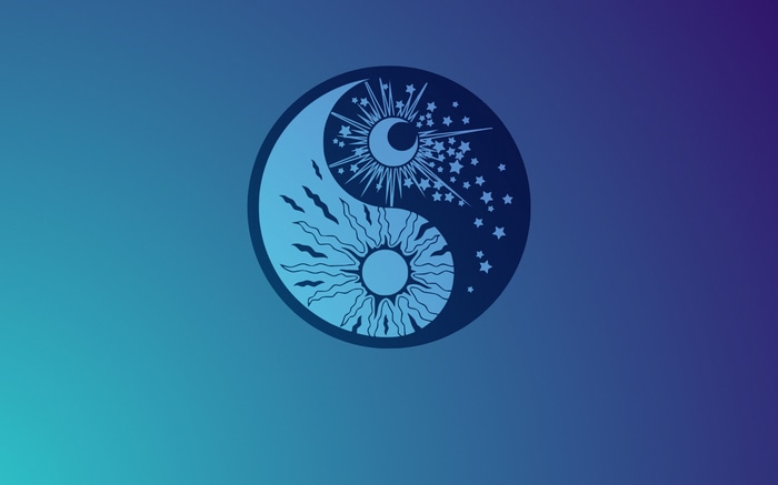 Yin and Yang symbol with sun and moon