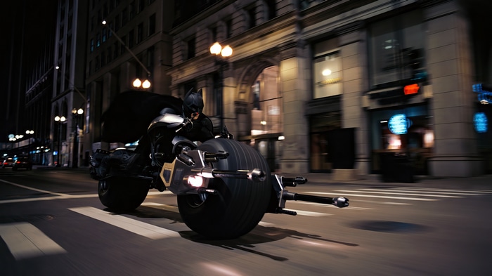Batman on the Batpod in Gotham City