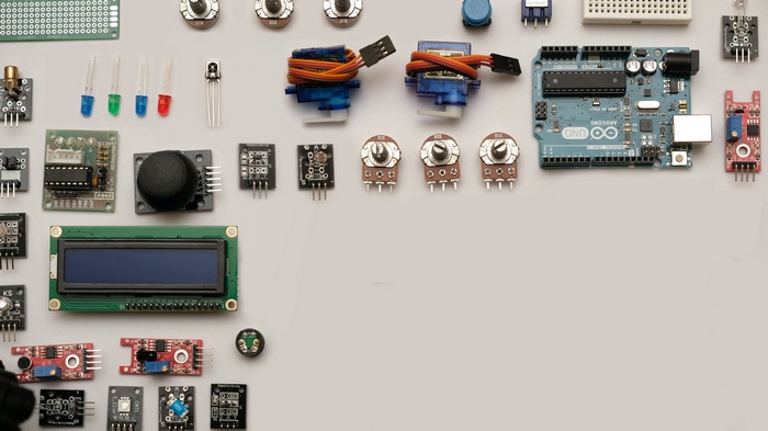 ARDUINO UNO and electronic components flat lay