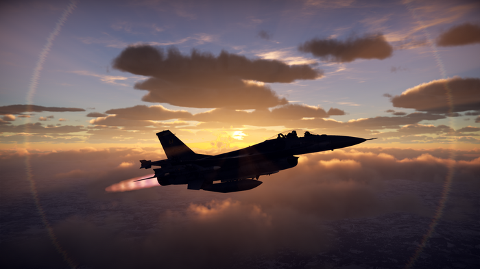 General Dynamics F-16 Fighting Falcon in sunset sky