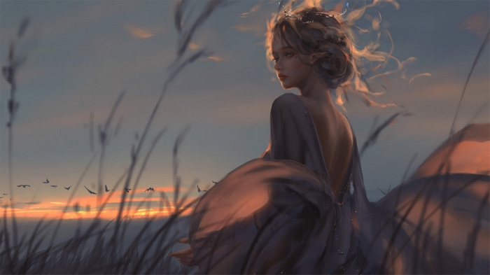 Fantasy girl with messy hair in a field at sunrise