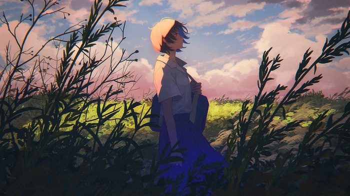 Girl in school uniform standing in a grassy field