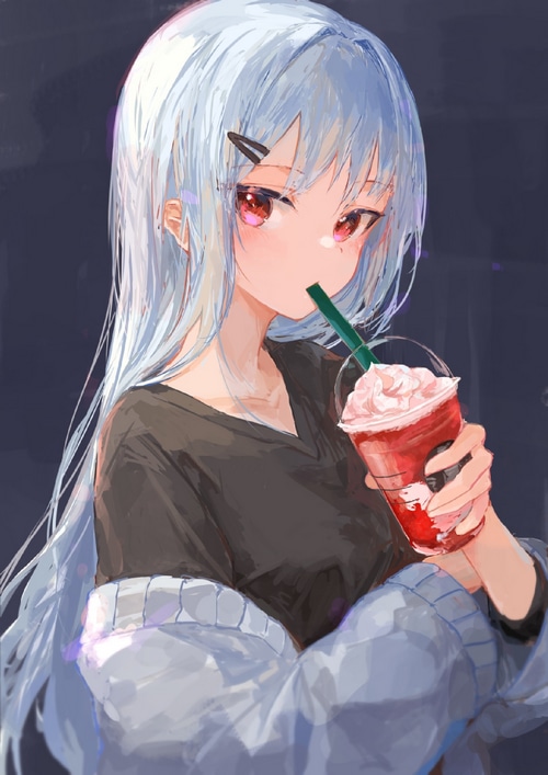 Girl drinking a strawberry Frappuccino