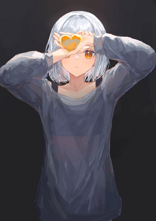 Girl holding a heart shape
