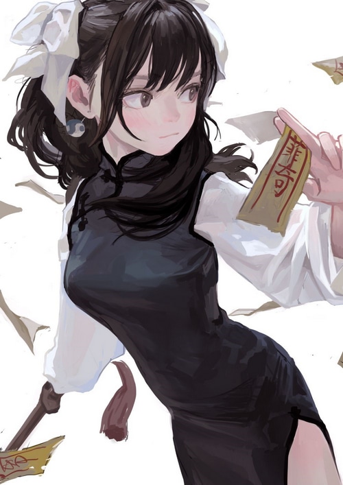 Girl in Chinese dress holding a talisman