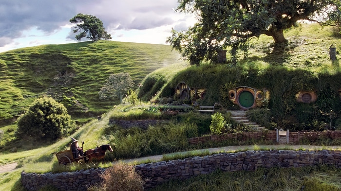 Gandalf in a carriage in The Shire