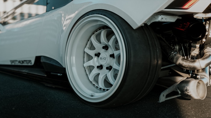 White Lamborghini Huracan with custom wheels