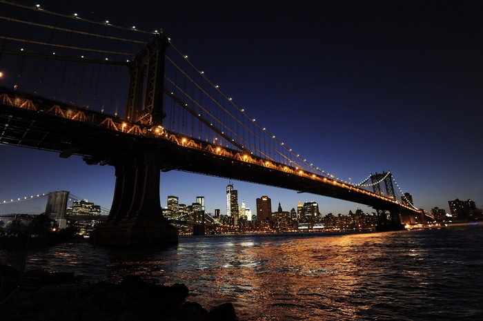 Manhattan Bridge at night over the East River