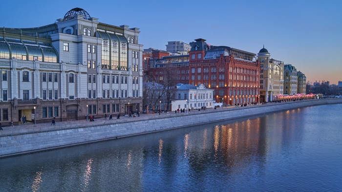 Buildings along the Moscow River at sunset