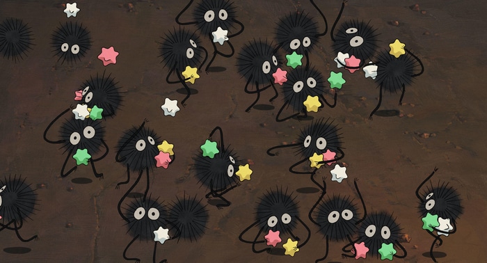 Susuwatari creatures from Spirited Away holding stars
