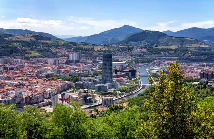Bilbao cityscape with mountains and river
