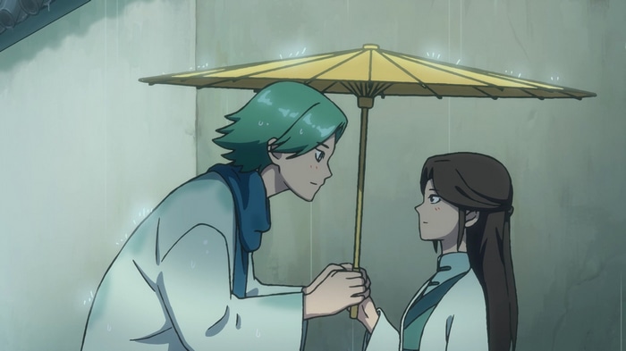 Huilian (Scissor Seven) sharing an umbrella in the rain