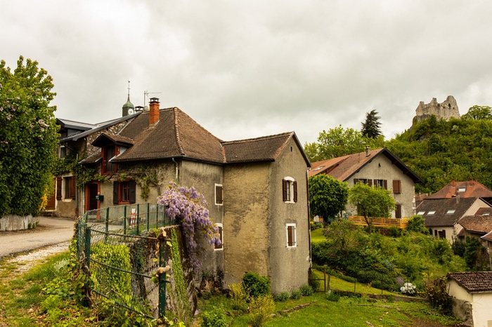 Village with castle ruins on a hill