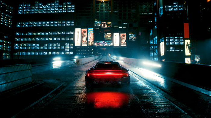 Cyberpunk 2077 car driving through a neon city at night