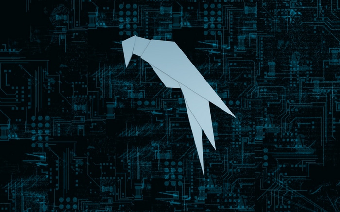 Origami parrot on a digital circuit board background