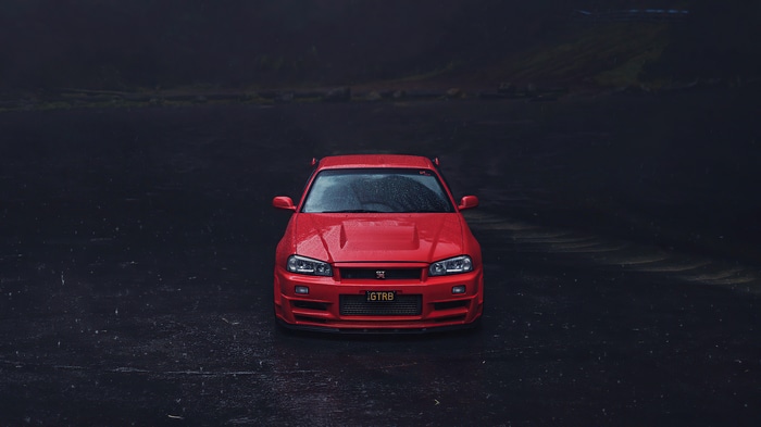 4K Red Nissan Skyline R34 Frontal View