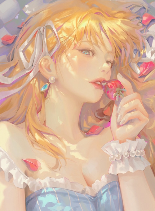 Woman with blonde hair eating a strawberry
