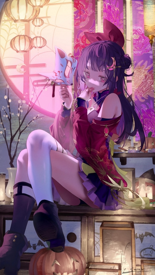 Girl with fox mask and pumpkin