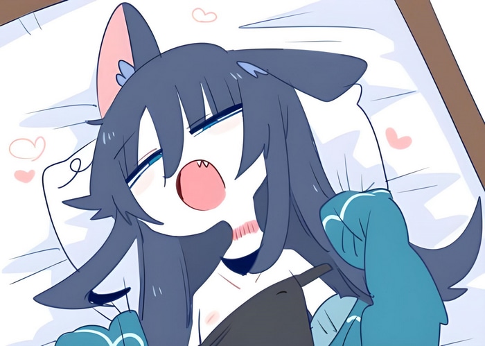 Anime girl with animal ears lying on a bed