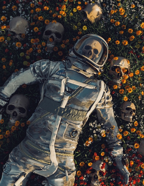 Astronaut lying in a field of flowers and skulls