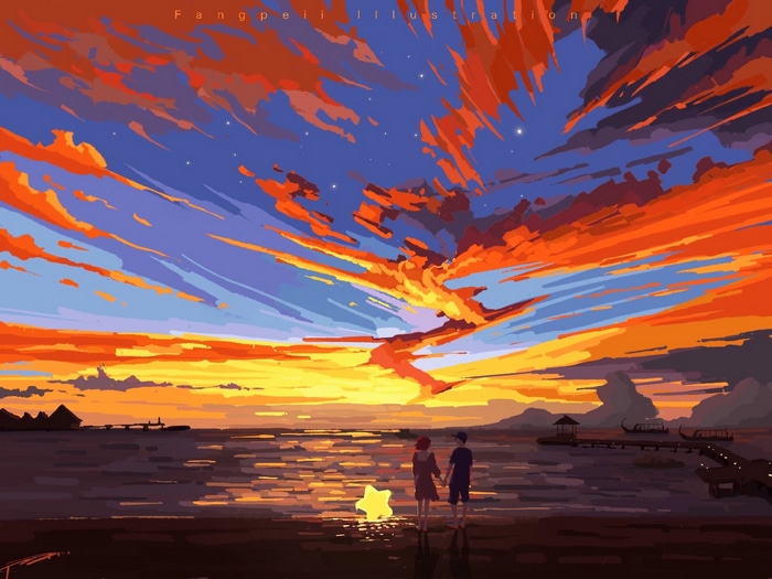 Couple holding hands on beach at sunset
