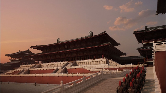Ancient Chinese palace with soldiers at sunset