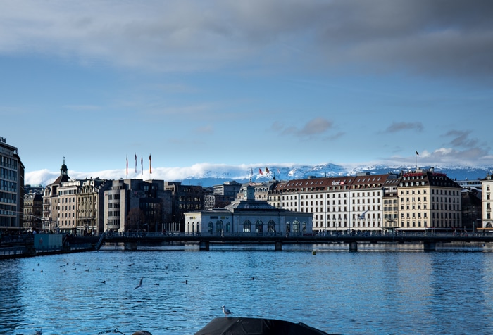 Geneva cityscape with lake and mountains