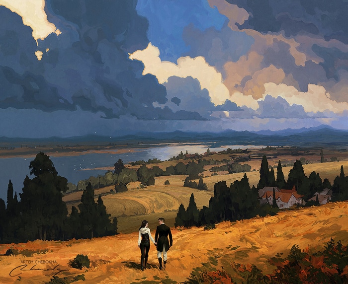 Couple walking through a golden field towards a lake