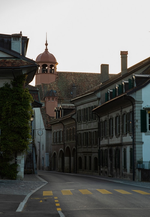 Street in a Swiss village with historic buildings