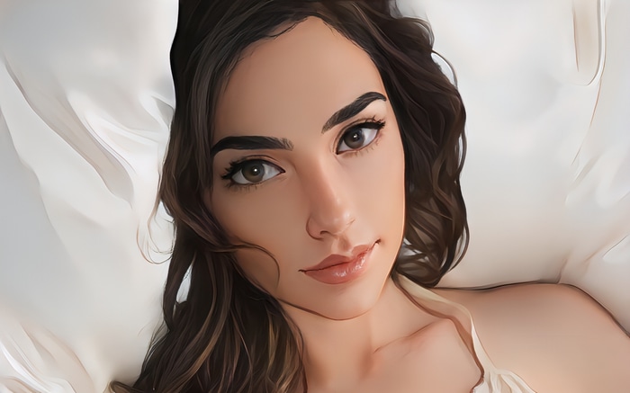 Gal Gadot lying on white fabric