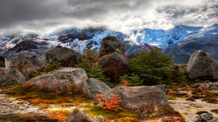 4K snow mountains with rocks and clouds by Trey Ratcliff