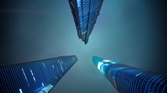 4K Shanghai skyscrapers viewed from below at night