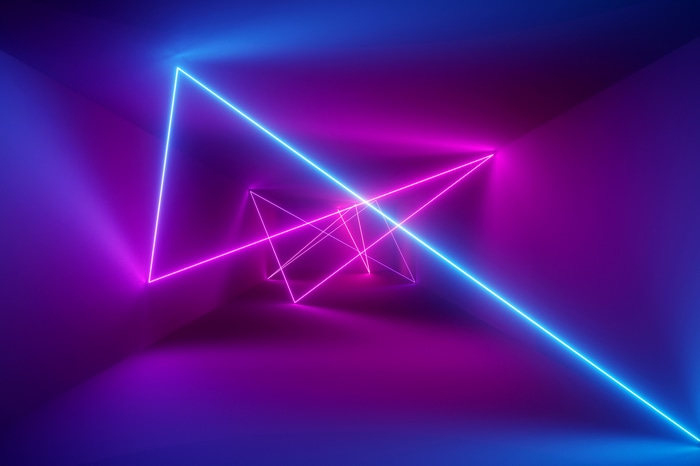 Neon geometric shapes in a dark room