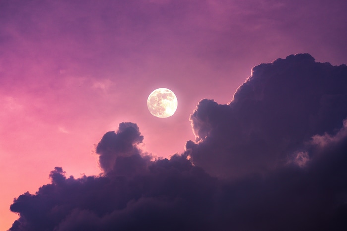 4K Moon and Clouds in Pink Sky